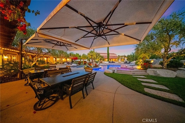 39190 Corte Venture, Temecula, CA 92592 - patio terrace at dusk with a patio, an outdoor pool, and outdoor dining space