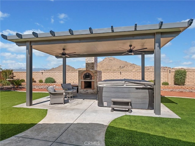 17028 Ta Ki Pi Rd, Apple Valley, CA 92307 - view of patio / terrace with a ceiling fan and a hot tub