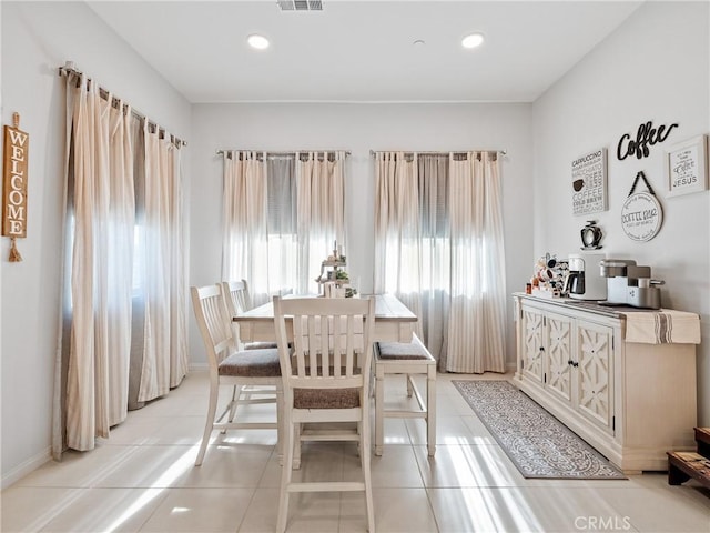17028 Ta Ki Pi Rd, Apple Valley, CA 92307 - dining space with light tile patterned floors, recessed lighting, and baseboards