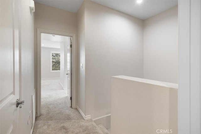 89 E Commonwealth Ave Unit 1P, Alhambra, CA 91801 - corridor with light colored carpet and baseboards