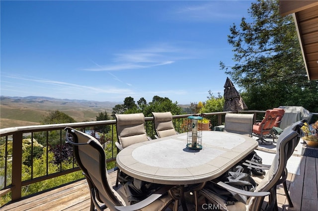 1760 Stuart St, Cambria, CA 93428 - wooden deck featuring outdoor dining area and a mountain view