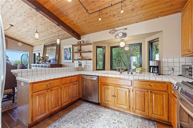1760 Stuart St, Cambria, CA 93428 - kitchen with stainless steel appliances, a sink, a peninsula, wood ceiling, and wood finished floors