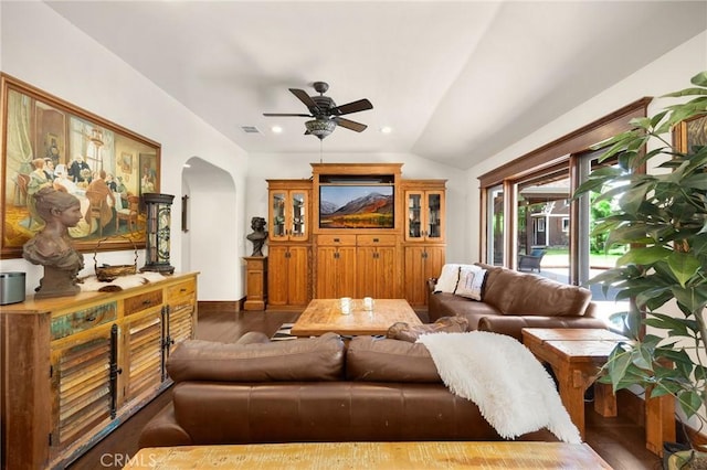 5121 E Lomita Ave, Orange, CA 92869 - living area featuring ceiling fan, arched walkways, vaulted ceiling, and wood finished floors