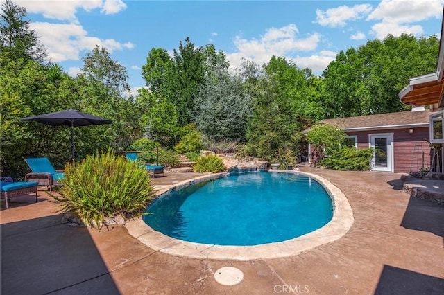 5121 E Lomita Ave, Orange, CA 92869 - swimming pool with a patio area