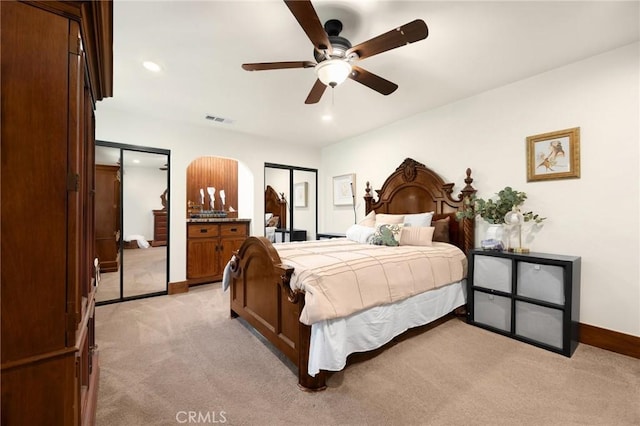 5121 E Lomita Ave, Orange, CA 92869 - bedroom with light carpet, baseboards, multiple closets, recessed lighting, and ceiling fan