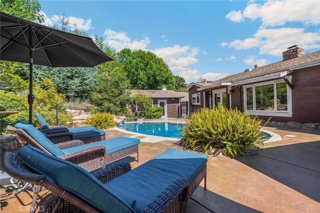 5121 E Lomita Ave, Orange, CA 92869 - outdoor pool with a patio and an outdoor structure