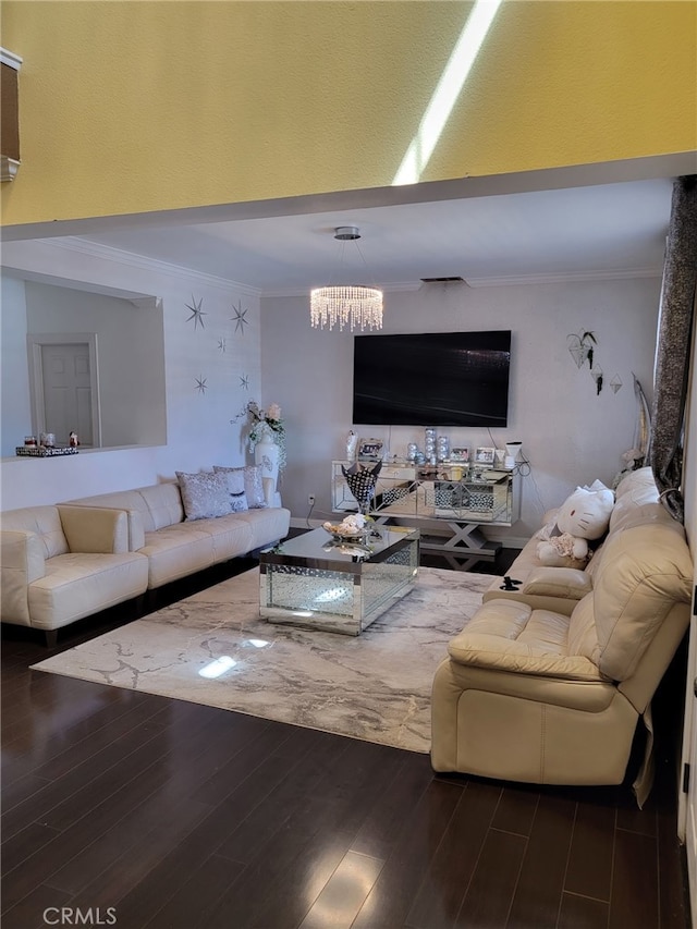 3052 Clapper St, Perris, CA 92571 - living area featuring ornamental molding, dark wood-type flooring, and a chandelier
