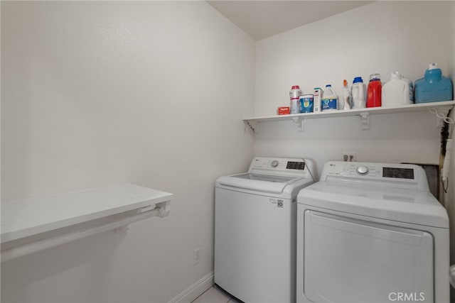 4033 N N Lang Ave, Covina, CA 91722 - laundry room featuring washing machine and clothes dryer and baseboards