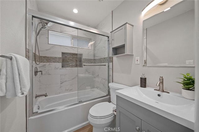 4033 N N Lang Ave, Covina, CA 91722 - bathroom featuring vanity, bath / shower combo with glass door, and toilet