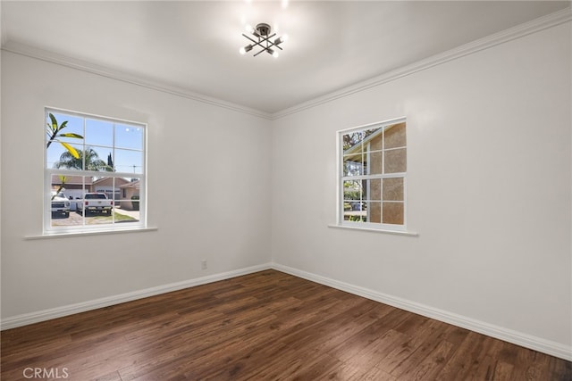 4033 N N Lang Ave, Covina, CA 91722 - unfurnished room featuring dark wood-style floors, crown molding, healthy amount of natural light, and baseboards