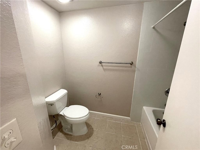 2563 Plaza Del Amo Unit 304, Torrance, CA 90503 - full bathroom with toilet, tile patterned flooring, baseboards, shower / bathtub combination, and a textured wall