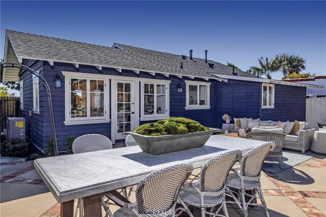 556 Through St, Laguna Beach, CA 92651 - view of patio / terrace featuring an outdoor living space, outdoor dining space, and french doors