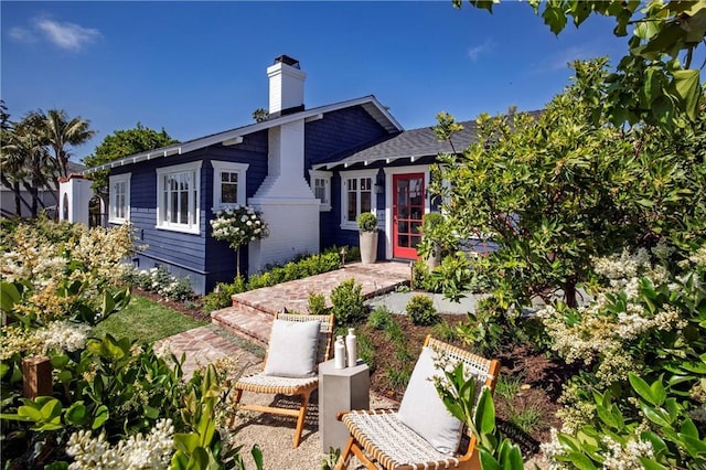 556 Through St, Laguna Beach, CA 92651 - view of front of house featuring a chimney