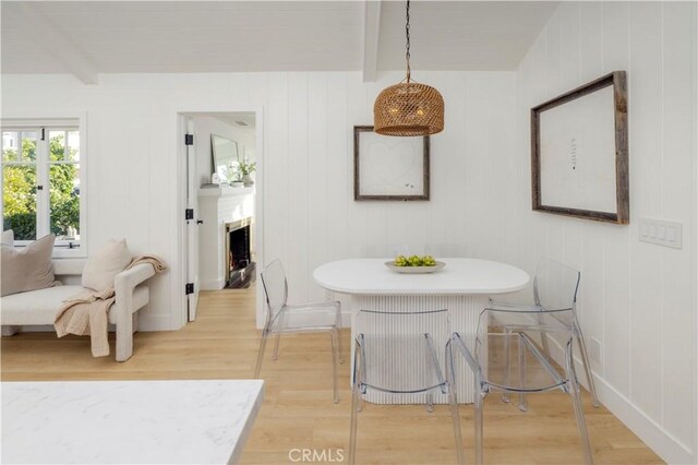 556 Through St, Laguna Beach, CA 92651 - dining room with beam ceiling and light wood-style floors
