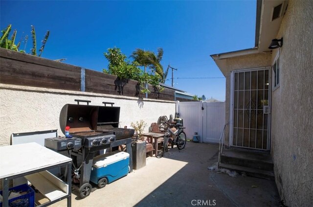 4547 W 141st St, Hawthorne, CA 90250 - view of patio with entry steps and a grill