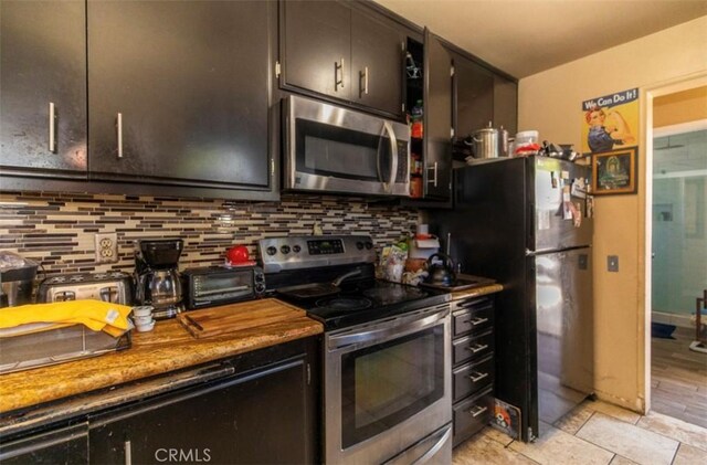 4547 W 141st St, Hawthorne, CA 90250 - kitchen featuring stainless steel appliances and tasteful backsplash