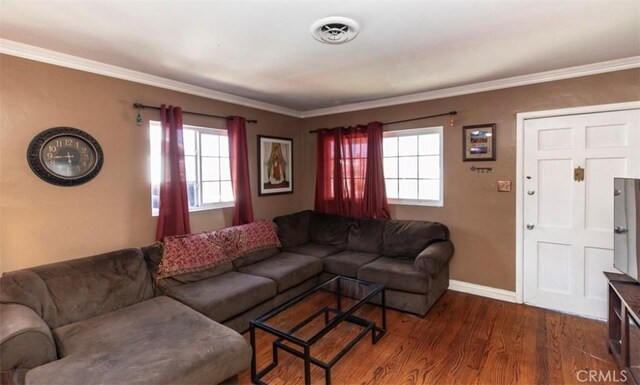 4547 W 141st St, Hawthorne, CA 90250 - living room with plenty of natural light, wood finished floors, and ornamental molding