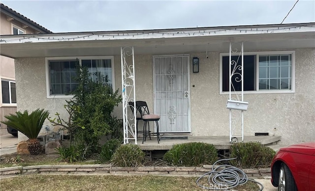 4547 W 141st St, Hawthorne, CA 90250 - view of exterior entry with stucco siding and covered porch