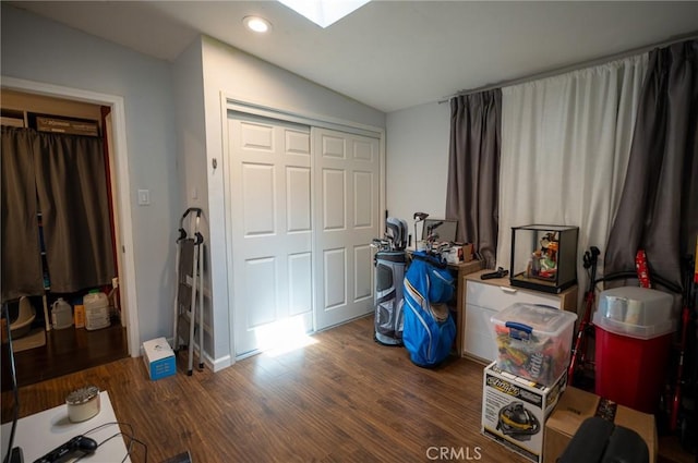 161 N Cota St, Corona, CA 92882 - misc room with lofted ceiling, recessed lighting, wood finished floors, and a skylight