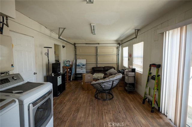 161 N Cota St, Corona, CA 92882 - washroom with a garage, washer and clothes dryer, and wood finished floors