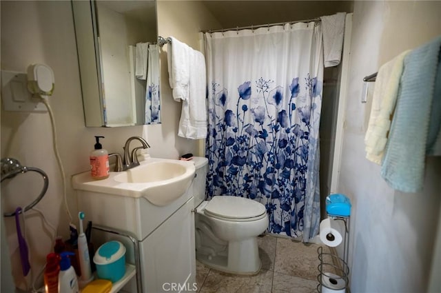 161 N Cota St, Corona, CA 92882 - full bathroom with vanity, toilet, and curtained shower