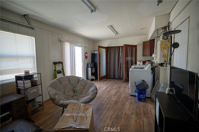 161 N Cota St, Corona, CA 92882 - sitting room with washer / clothes dryer and wood finished floors