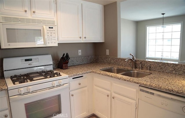 27971 Via Moreno, Laguna Niguel, CA 92677 - kitchen with white appliances, a sink, white cabinetry, and light stone counters