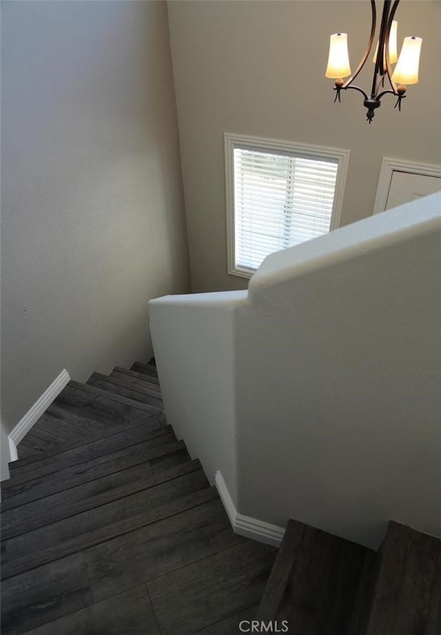 27971 Via Moreno, Laguna Niguel, CA 92677 - stairs with baseboards and a chandelier
