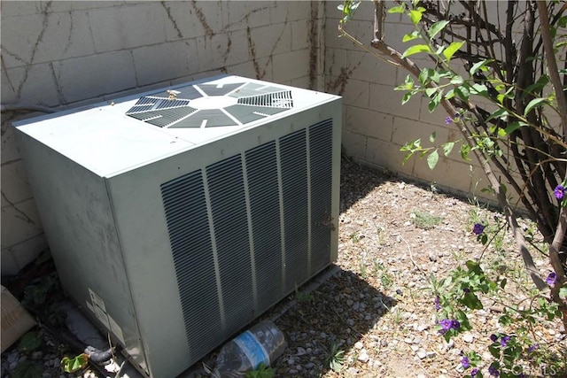 3641 Adams St, Riverside, CA 92504 - exterior view of central AC unit and concrete block siding