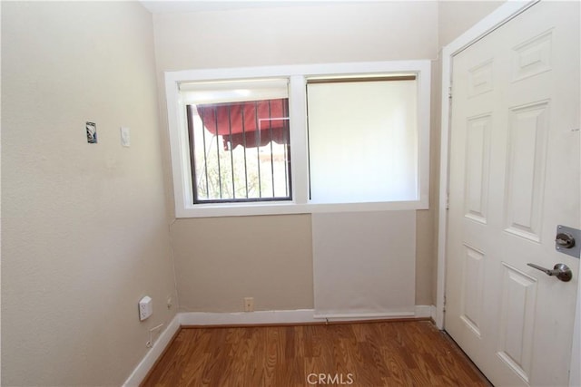 3641 Adams St, Riverside, CA 92504 - empty room featuring plenty of natural light, wood finished floors, and baseboards