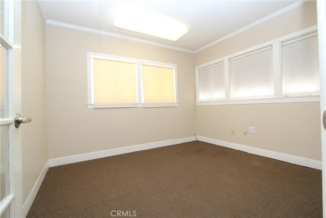 3641 Adams St, Riverside, CA 92504 - empty room featuring crown molding, dark colored carpet, and baseboards