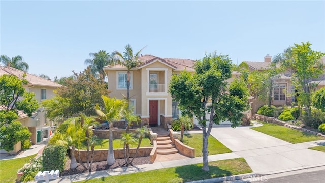 4127 Forest Highlands Cir, Corona, CA 92883 - view of front of property with driveway, stucco siding, a front yard, and a tiled roof