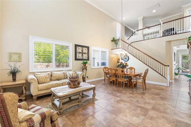 4127 Forest Highlands Cir, Corona, CA 92883 - living room featuring a towering ceiling, stairs, baseboards, and crown molding