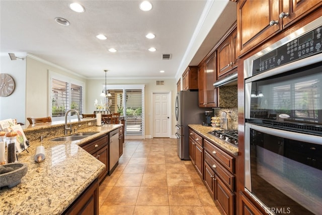 4127 Forest Highlands Cir, Corona, CA 92883 - kitchen with stainless steel appliances, a sink, ornamental molding, tasteful backsplash, and recessed lighting