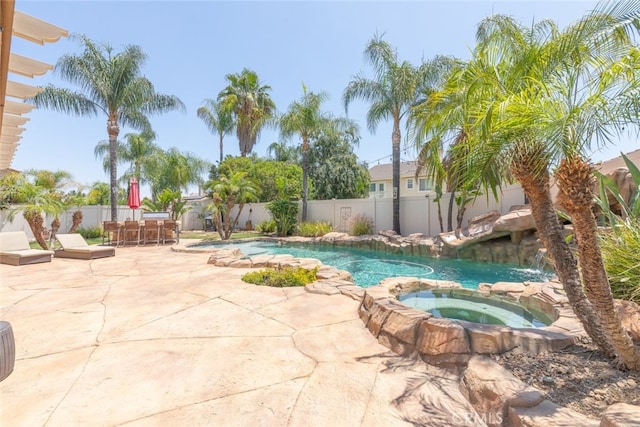 4127 Forest Highlands Cir, Corona, CA 92883 - view of swimming pool featuring a patio, a pool with connected hot tub, a fenced backyard, and outdoor dining area