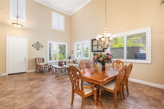 4127 Forest Highlands Cir, Corona, CA 92883 - dining area with a towering ceiling, a chandelier, crown molding, baseboards, and tile patterned flooring