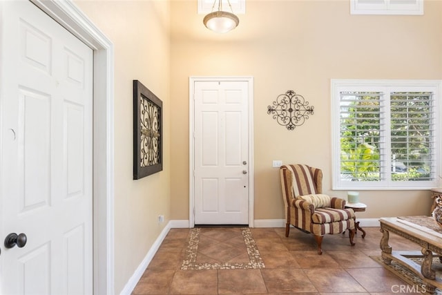 4127 Forest Highlands Cir, Corona, CA 92883 - foyer entrance with baseboards, tile patterned floors, and a high ceiling
