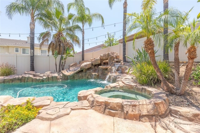 4127 Forest Highlands Cir, Corona, CA 92883 - view of pool with a fenced backyard and a pool with connected hot tub