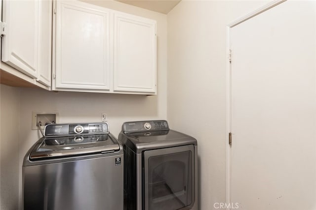 4127 Forest Highlands Cir, Corona, CA 92883 - laundry area featuring cabinet space and washing machine and clothes dryer