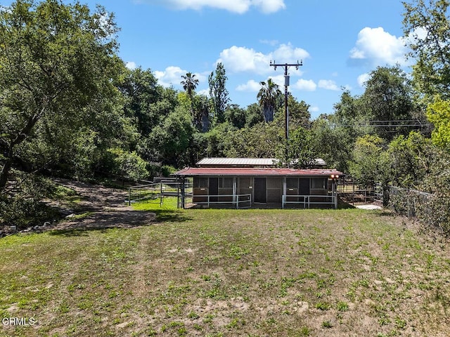 4144 Chevy Chase Dr, La Canada Flintridge, CA 91011 - rear view of house featuring an exterior structure, an outbuilding, and metal roof