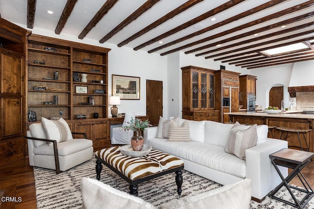 4144 Chevy Chase Dr, La Canada Flintridge, CA 91011 - living area with beamed ceiling, arched walkways, wood finished floors, and recessed lighting