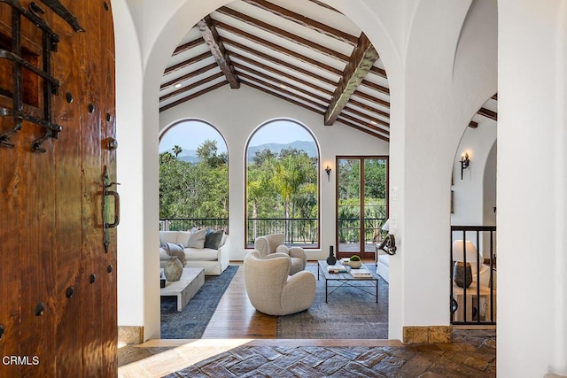 4144 Chevy Chase Dr, La Canada Flintridge, CA 91011 - living area featuring beam ceiling, arched walkways, and high vaulted ceiling