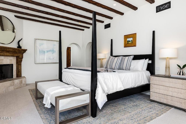 4144 Chevy Chase Dr, La Canada Flintridge, CA 91011 - bedroom with carpet flooring, beamed ceiling, a tiled fireplace, and recessed lighting