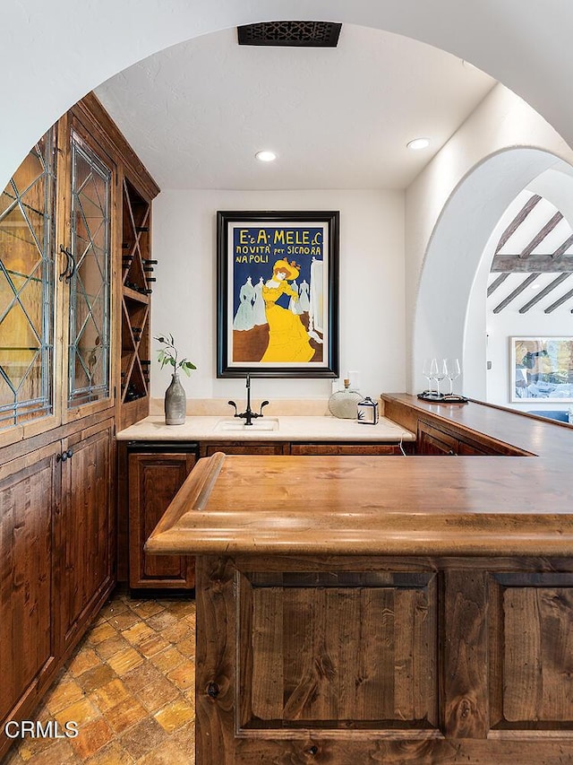 4144 Chevy Chase Dr, La Canada Flintridge, CA 91011 - indoor wet bar featuring light stone finish flooring and recessed lighting