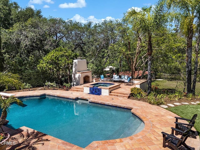 4144 Chevy Chase Dr, La Canada Flintridge, CA 91011 - view of pool featuring a patio area, exterior fireplace, and an in-ground hot tub
