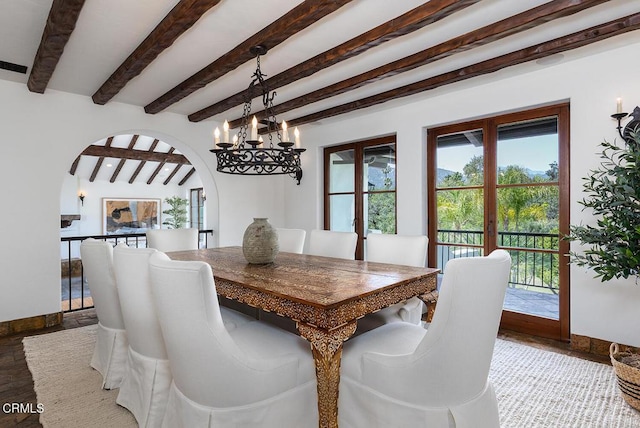 4144 Chevy Chase Dr, La Canada Flintridge, CA 91011 - dining room featuring a chandelier, beamed ceiling, arched walkways, and baseboards