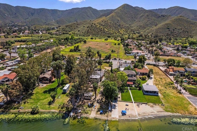 17030 Grand Ave, Lake Elsinore, CA 92530 - aerial view of property and surrounding area featuring nearby suburban area and a water and mountain view