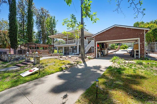 17030 Grand Ave, Lake Elsinore, CA 92530 - view of yard with stairway and a garage