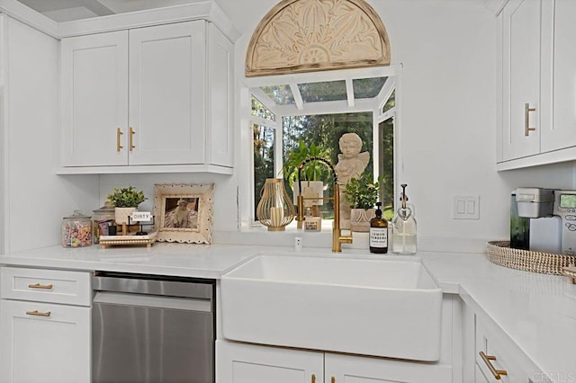 17030 Grand Ave, Lake Elsinore, CA 92530 - kitchen with stainless steel dishwasher, light countertops, and white cabinets