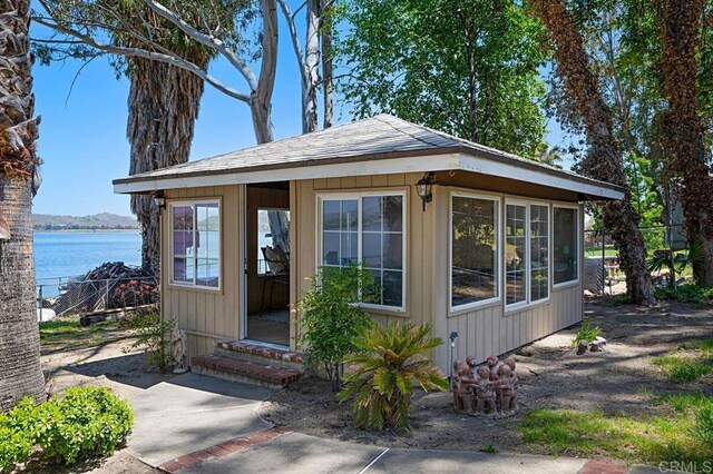 17030 Grand Ave, Lake Elsinore, CA 92530 - view of front of home featuring a water view and entry steps